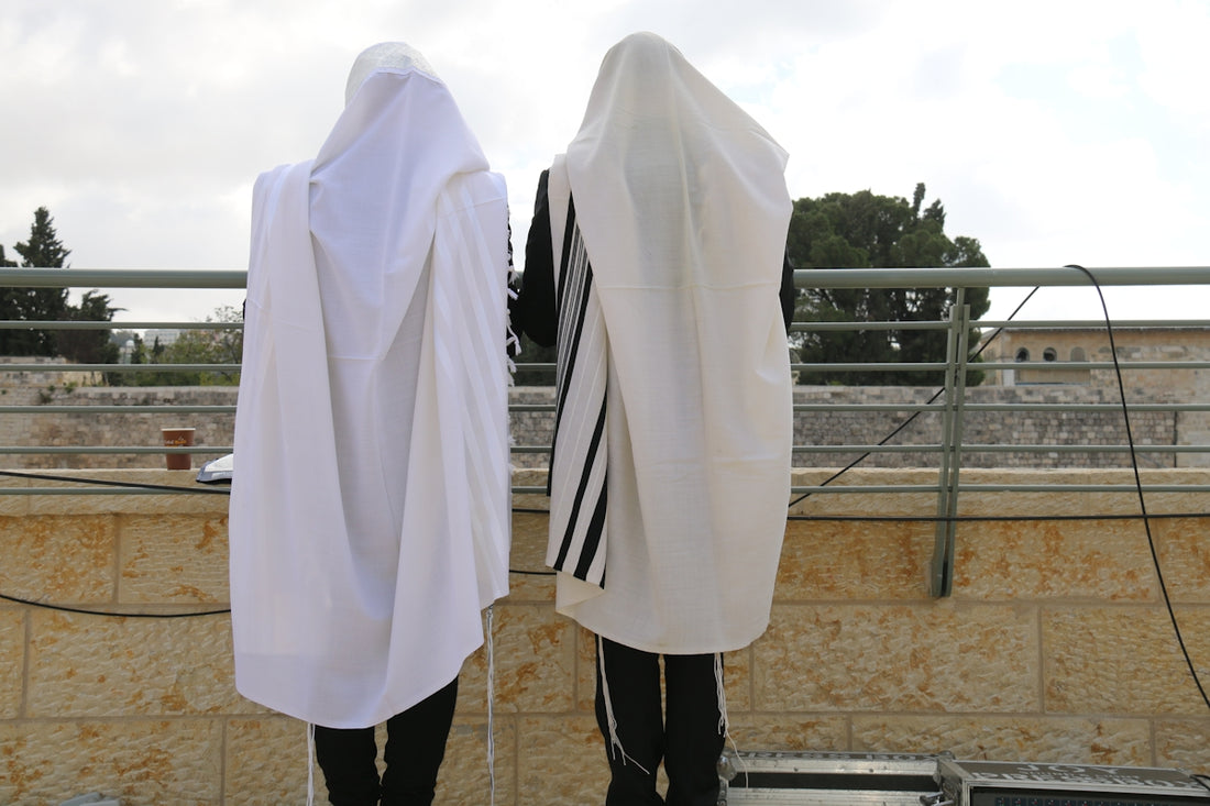 a couple of people standing next to each other